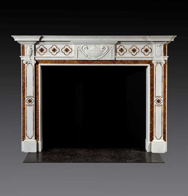 AN IRISH GEORGE III MARBLE CHIMNEYPIECE ATTRIBUTED TO GEORGE AND HILL DARLEY